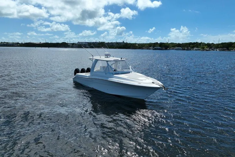  Yacht Photos Pics 2008 Hydra-Sports Vector 3500 VX boat on calm water under blue sky.