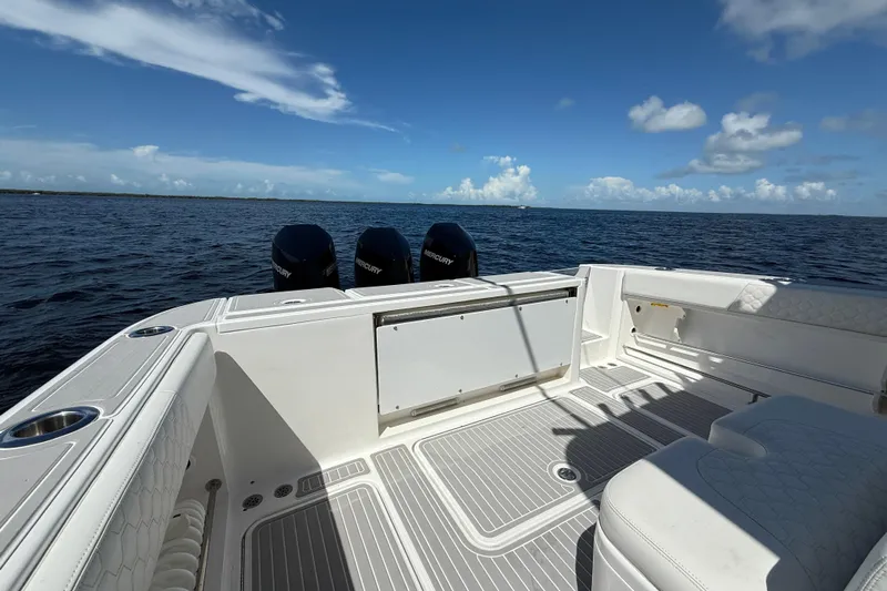  Yacht Photos Pics 2008 Hydra-Sports Vector 3500 VX boat deck with triple Mercury engines on open water.