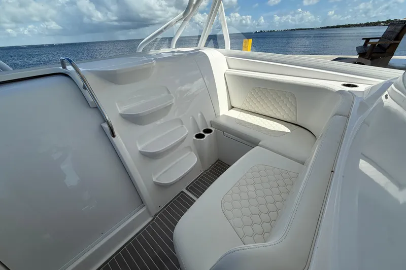  Yacht Photos Pics 2008 Hydra-Sports Vector 3500 VX boat interior with white seating and ocean view.
