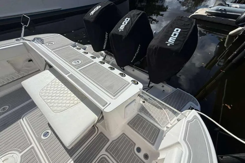  Yacht Photos Pics 2008 Hydra-Sports Vector 3500 VX boat with covered engines and sleek deck design.