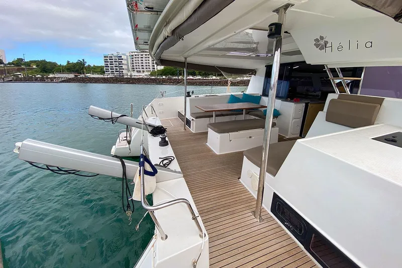  Yacht Photos Pics Fountaine Pajot Helia 44 catamaran, 2014 model, docked with spacious deck and seating area.