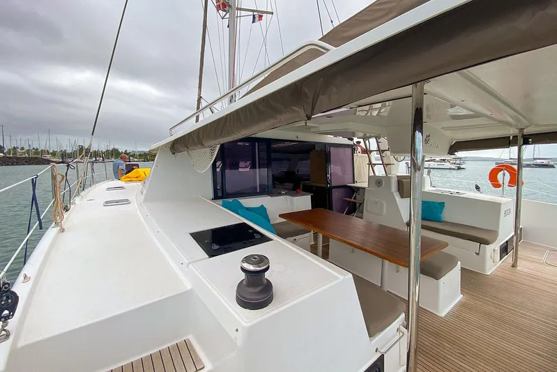  Yacht Photos Pics 2014 Fountaine Pajot Helia 44 catamaran with spacious deck and seating area.