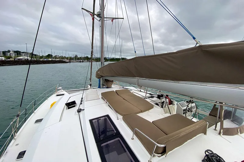  Yacht Photos Pics 2014 Fountaine Pajot Helia 44 catamaran with spacious deck and seating, docked in a marina.