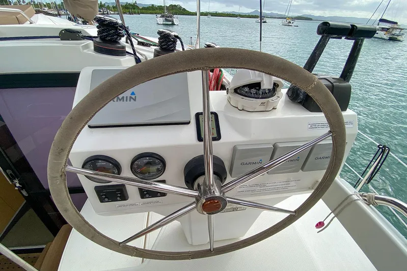  Yacht Photos Pics Helm of 2014 Fountaine Pajot Helia 44 catamaran with navigation instruments.