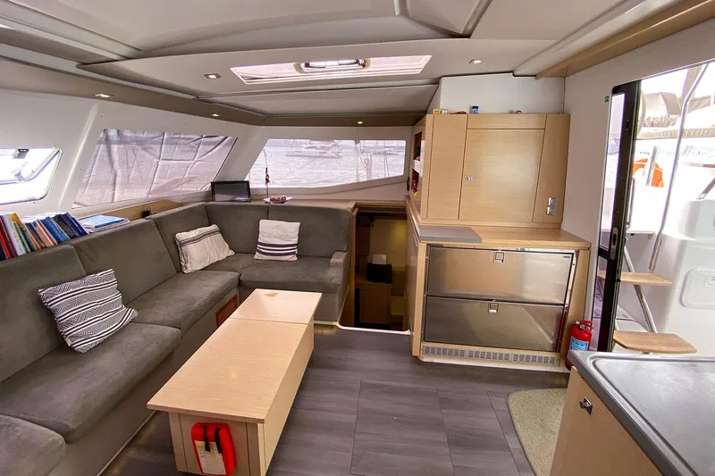  Yacht Photos Pics Luxurious interior of 2014 Fountaine Pajot Helia 44 catamaran with modern furnishings.