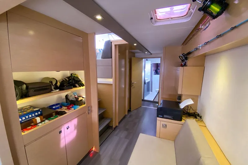  Yacht Photos Pics Interior of 2014 Fountaine Pajot Helia 44 catamaran, featuring modern design and ample storage.