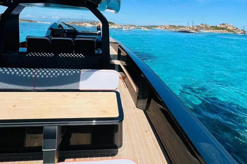 Chou Chou Yacht Photos Pics Luxurious 2023 Maori M 46 yacht on clear blue waters, featuring sleek design and spacious deck.