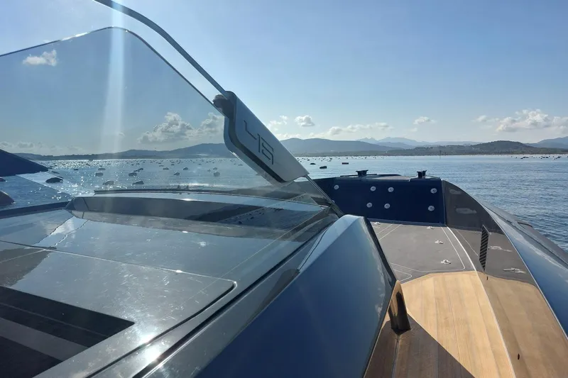 Chou Chou Yacht Photos Pics 2023 Maori M 46 yacht cruising on a sunny day with scenic ocean view.