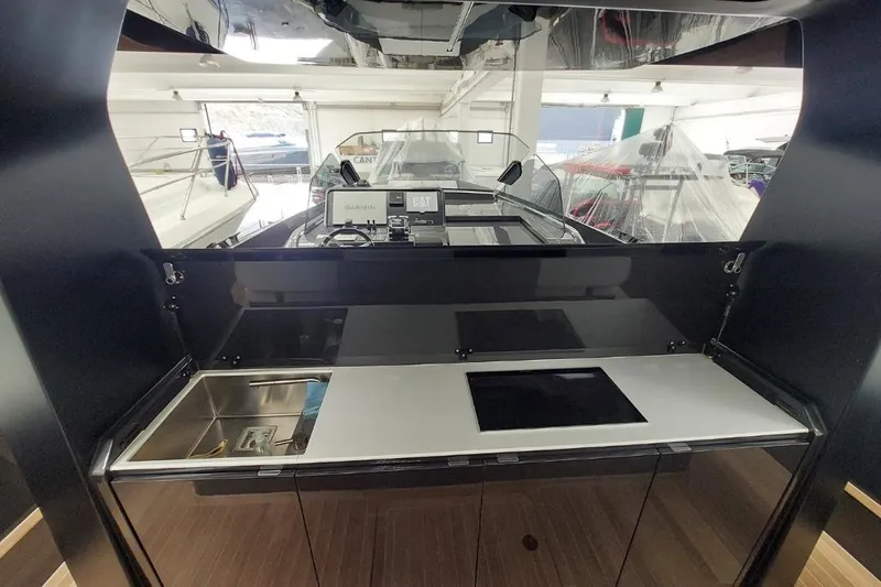 Chou Chou Yacht Photos Pics Modern kitchen area on 2023 Maori M 46 yacht, featuring sleek design and advanced appliances.