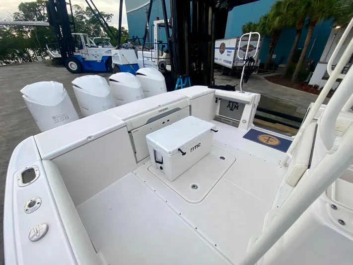 Wahooo Yacht Photos Pics 2016 Everglades 435 Center Console boat with Yeti cooler and quad engines at dock.