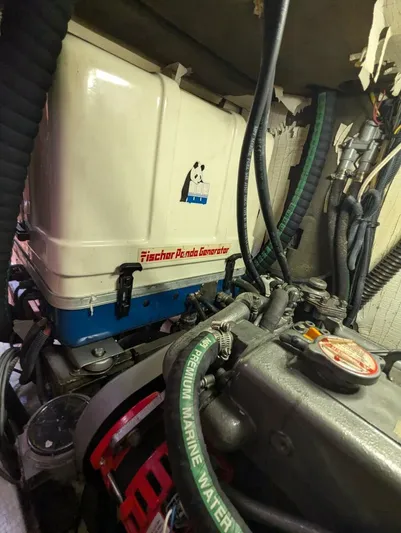 Momentum Yacht Photos Pics Engine room of 2007 Hunter 45 Center Cockpit with Fischer Panda generator.