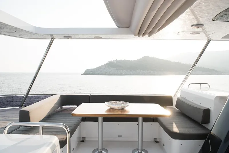  Yacht Photos Pics Luxurious 2021 Sirena 58 yacht interior with elegant seating and ocean view.