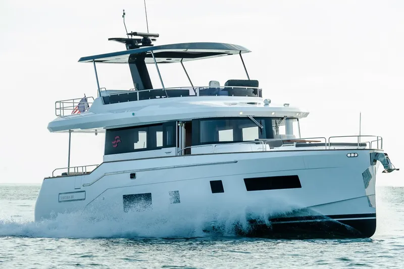  Yacht Photos Pics Luxury 2021 Sirena 58 yacht cruising on open water.