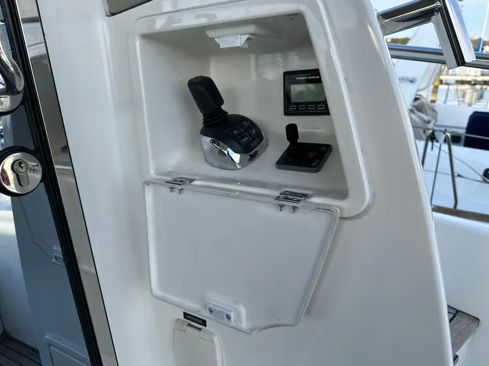  Yacht Photos Pics Control panel of a 2015 Prestige 500 S yacht, featuring joystick and display.