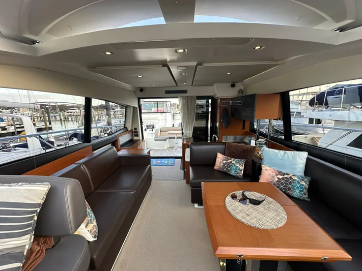  Yacht Photos Pics Luxurious interior of a 2015 Prestige 500 S yacht with elegant seating and decor.