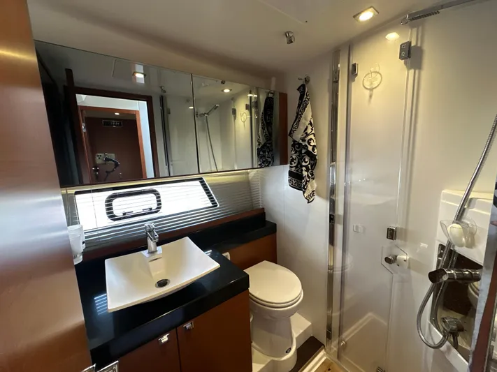  Yacht Photos Pics Luxurious bathroom in 2015 Prestige 500 S yacht with modern fixtures and elegant design.
