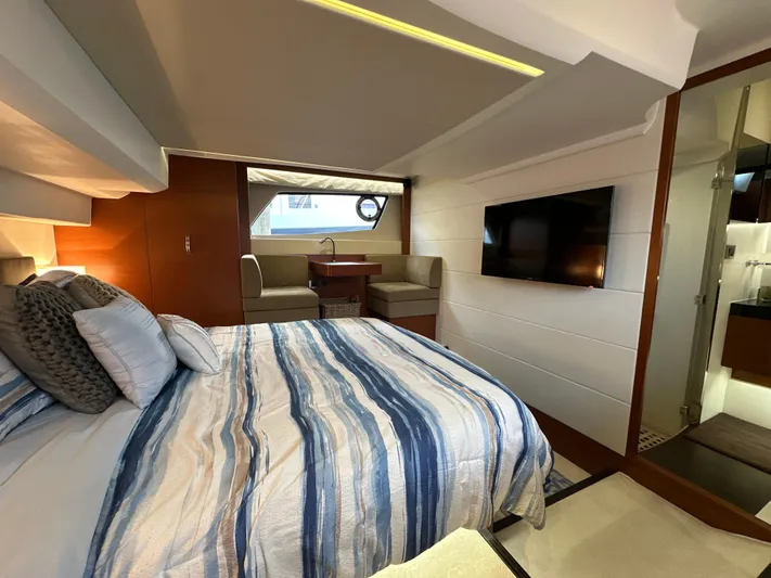  Yacht Photos Pics Luxurious interior of 2015 Prestige 500 S yacht with cozy bed and modern amenities.