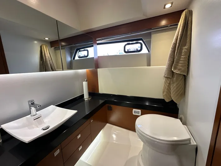  Yacht Photos Pics Luxurious bathroom in 2015 Prestige 500 S yacht with modern fixtures and elegant design.