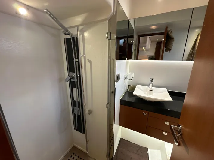  Yacht Photos Pics Luxurious bathroom in 2015 Prestige 500 S yacht with modern shower and sink.