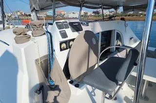 Buzio Yacht Photos Pics 2014 Lagoon 380 S2 yacht cockpit with navigation instruments and seating.