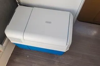 Buzio Yacht Photos Pics White and blue portable cooler on a Lagoon 380 S2, 2014 model.