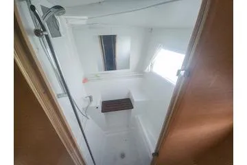Buzio Yacht Photos Pics 2014 Lagoon 380 S2 yacht bathroom with shower and window.