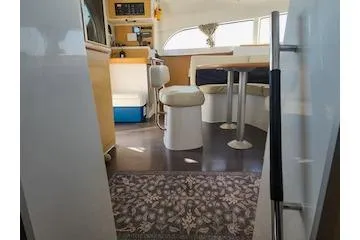 Buzio Yacht Photos Pics Interior of 2014 Lagoon 380 S2 catamaran with modern seating and decor.