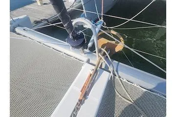 Buzio Yacht Photos Pics 2014 Lagoon 380 S2 catamaran deck with rigging and netting details.