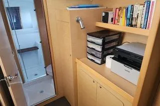 Buzio Yacht Photos Pics Interior of 2014 Lagoon 380 S2 yacht with office setup and bathroom.