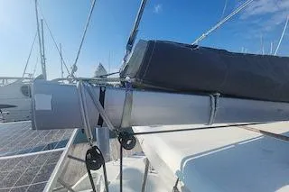 Buzio Yacht Photos Pics 2014 Lagoon 380 S2 sailboat mast and rigging under clear blue sky.