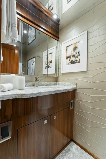 Aussie Rules Yacht Photos Pics Luxurious bathroom in 2017 Viking 92 Enclosed Bridge yacht with modern decor.