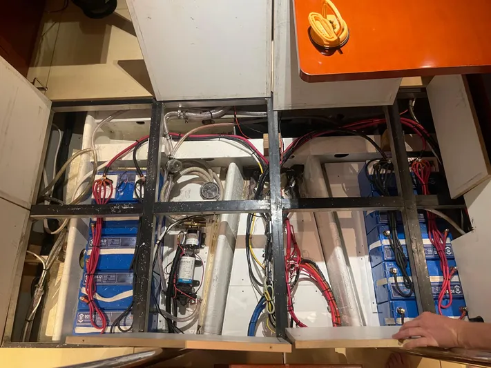 Blue Yacht Photos Pics Electrical system of a 2006 Hanse 461 yacht, featuring batteries and wiring.