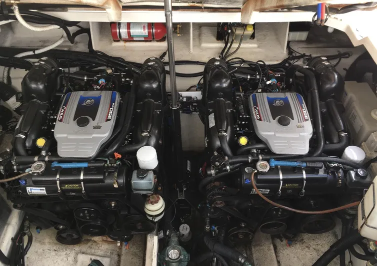  Yacht Photos Pics Twin engines of a 2010 Sea Ray 330 Sundancer boat in the engine compartment.