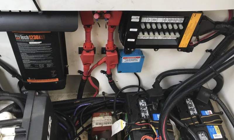  Yacht Photos Pics Electrical system of a 2010 Sea Ray 330 Sundancer boat, featuring batteries and wiring.