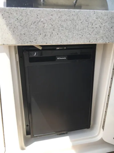  Yacht Photos Pics Compact Dometic refrigerator in 2010 Sea Ray 330 Sundancer boat galley.