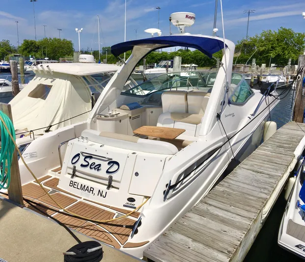  Yacht Photos Pics 2010 Sea Ray 330 Sundancer docked in Belmar, NJ marina.