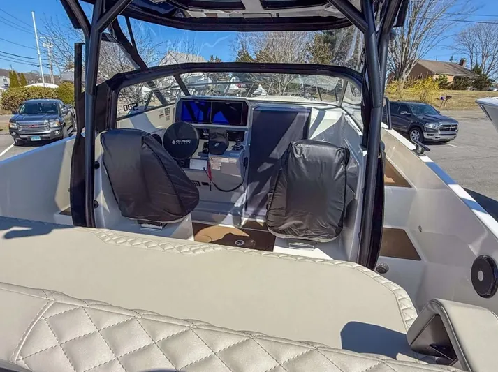  Yacht Photos Pics Interior view of 2025 Navan S30 boat with modern dashboard and seating.