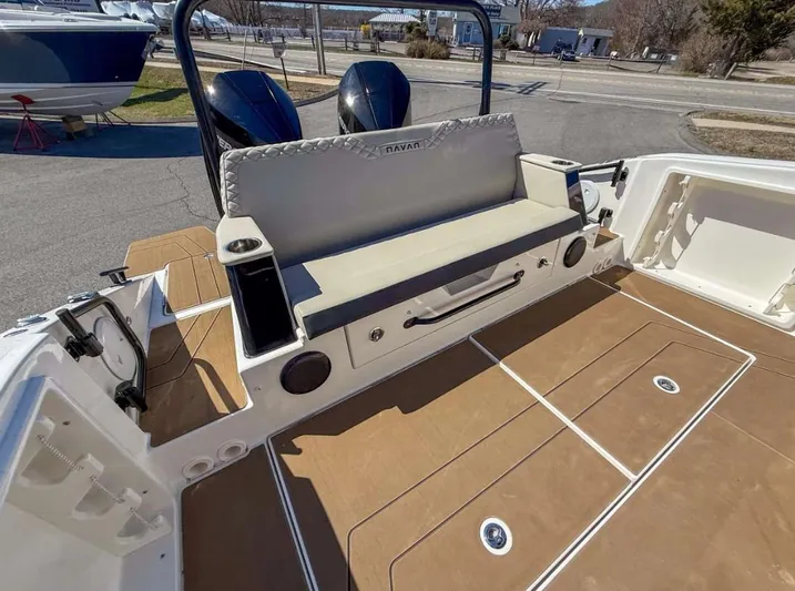  Yacht Photos Pics Navan S30 2025 boat interior with cushioned seating and dual outboard motors.
