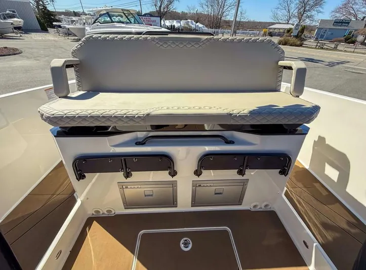  Yacht Photos Pics 2025 Navan S30 boat interior with cushioned seating and storage compartments.