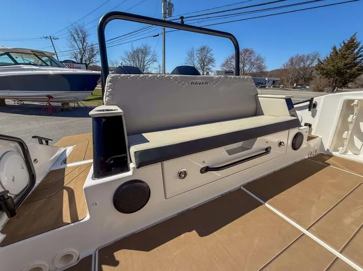  Yacht Photos Pics 2025 Navan S30 boat interior with cushioned seating and modern design elements.