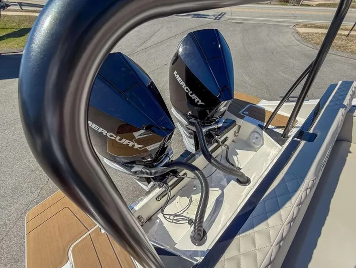  Yacht Photos Pics 2025 Navan S30 boat with dual Mercury outboard engines, viewed from the deck.