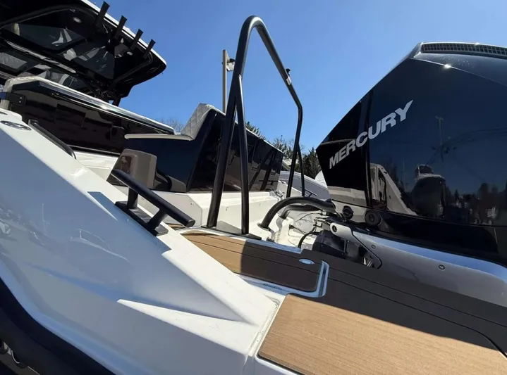  Yacht Photos Pics 2025 Navan S30 boat with Mercury engine, featuring sleek design and modern amenities.