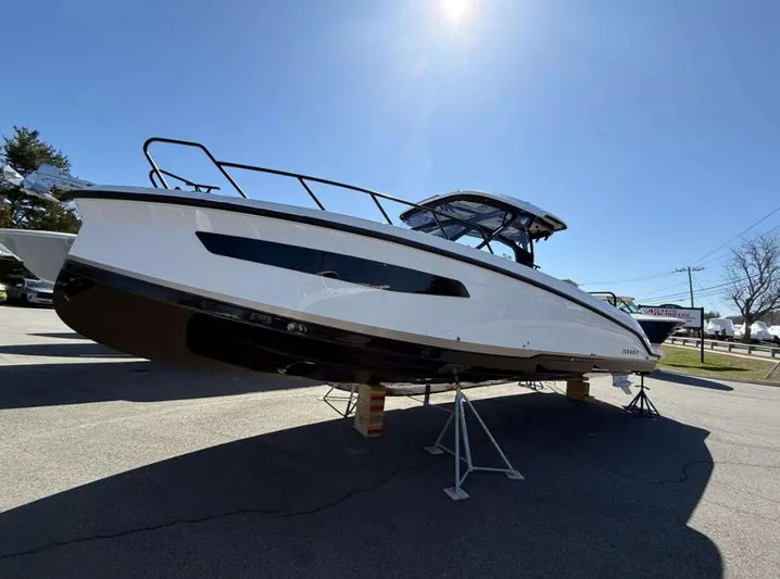  Yacht Photos Pics 2025 Navan S30 boat displayed outdoors under clear blue sky.