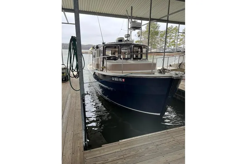 Lady Mary Yacht Photos Pics 2009 Ranger Tugs R-29 docked in a covered marina, front view.