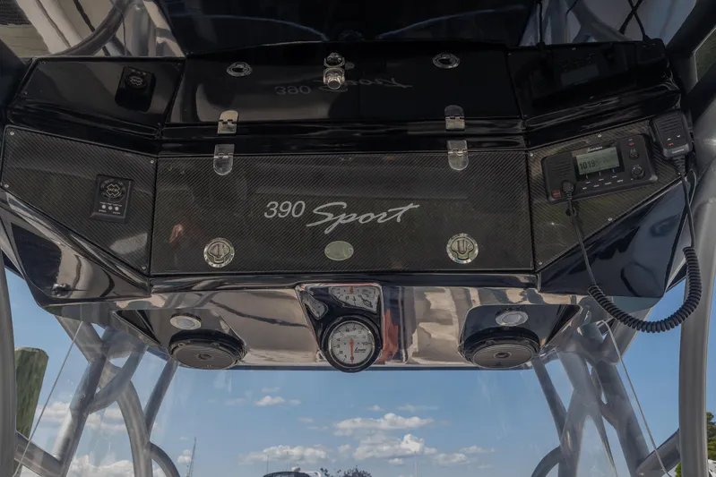  Yacht Photos Pics 2014 Nor-Tech 390 Sport Cuddy Center Console dashboard with navigation equipment and controls.