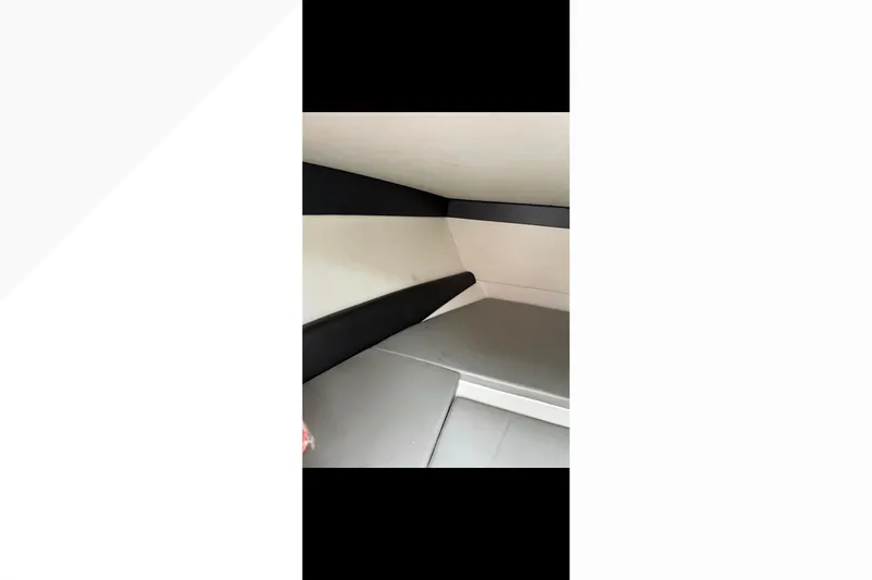  Yacht Photos Pics Interior of 2014 Nor-Tech 390 Sport Cuddy Center Console, featuring cushioned seating.