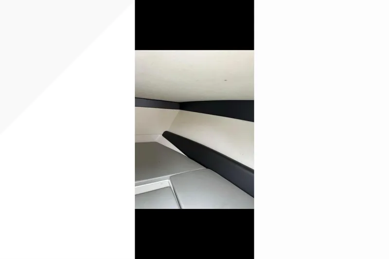  Yacht Photos Pics 2014 Nor-Tech 390 Sport Cuddy Center Console interior with sleek, modern design.