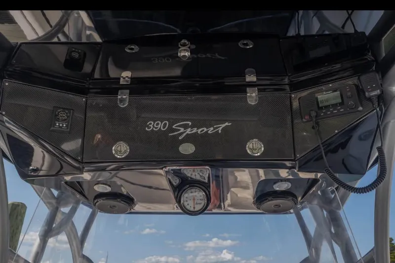  Yacht Photos Pics 2014 Nor-Tech 390 Sport Cuddy Center Console dashboard with controls and gauges.