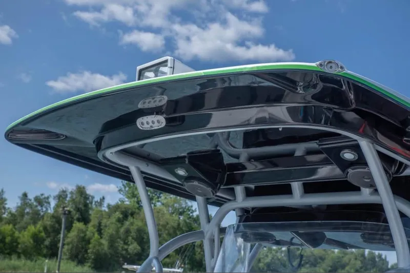  Yacht Photos Pics 2014 Nor-Tech 390 Sport Cuddy Center Console boat top view under blue sky.