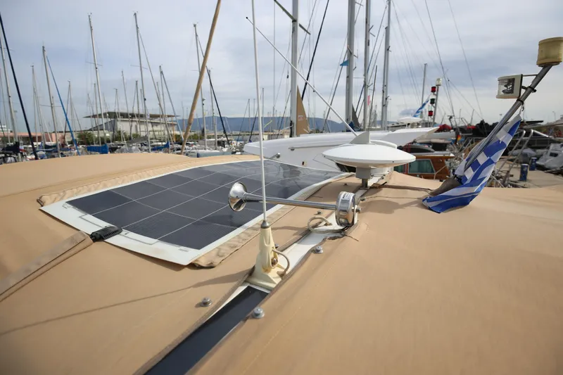  Yacht Photos Pics 1993 Princess 366 Riviera yacht with solar panel and Greek flag in marina.